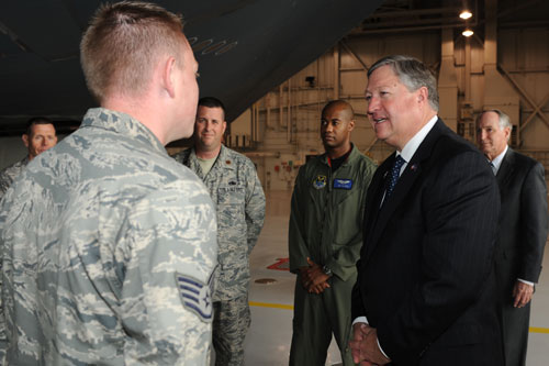 Staff Sgt. Jacob Westad briefs Secretary of the Air Force Michael Donley on hangar B-2 operations during his visit June 8.
